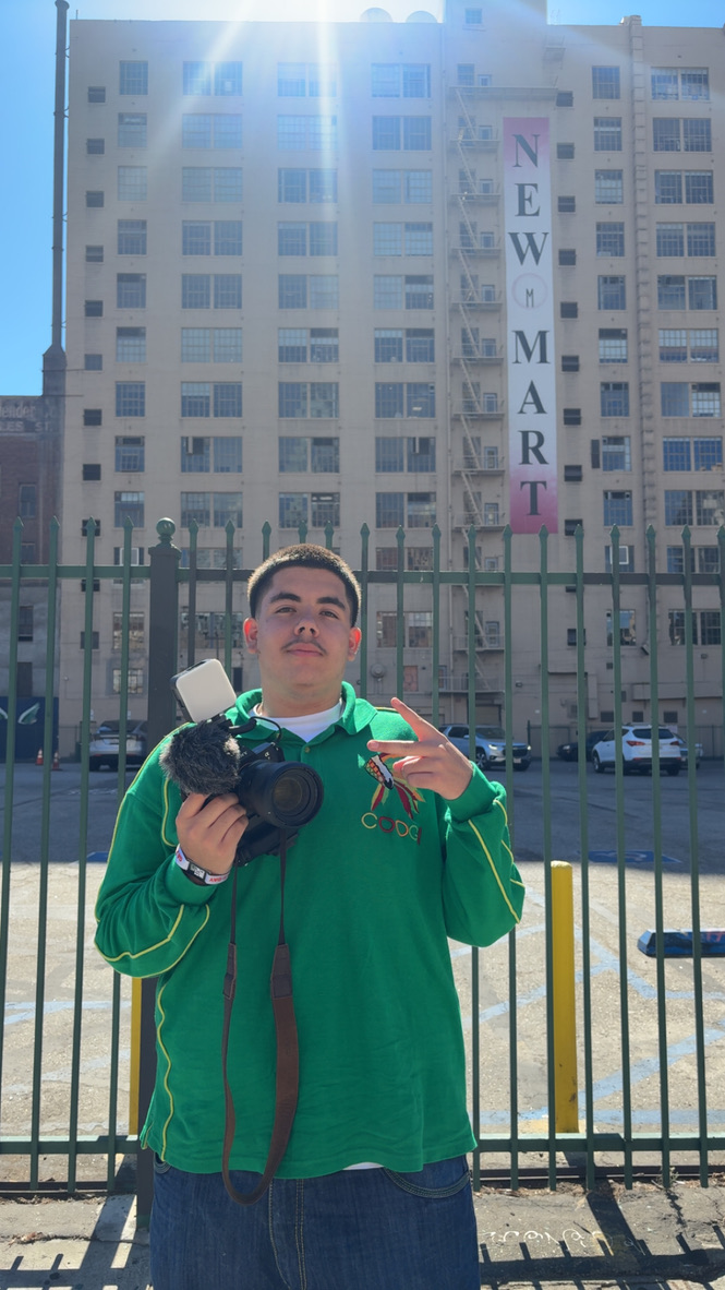 Joshwa Gonzalez holding his camera